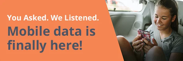 Photo of a smiling young girl with a phone and a headline reading: You Asked. We Listened. Mobile data is finally here!