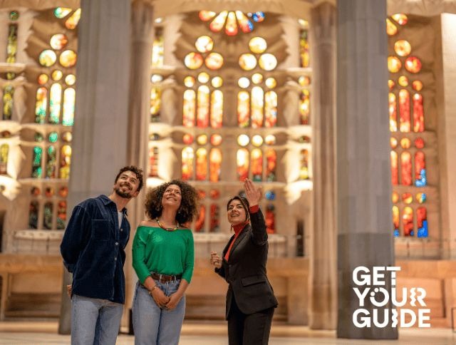 Two travelers are taking a GetYourGuide tour through a museum. Book your experience now.