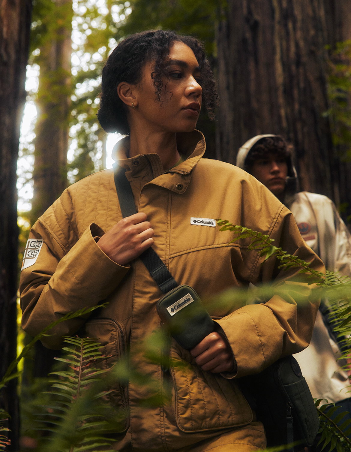 Woman in forest wearing Endor Collection gear.