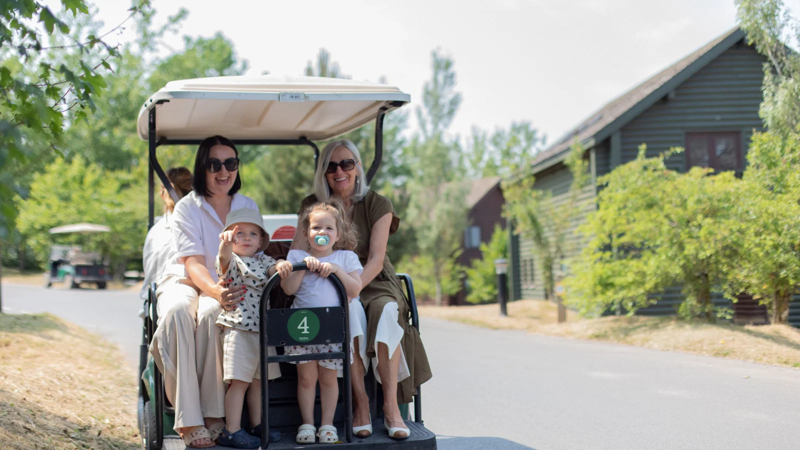 family on buggies in summer