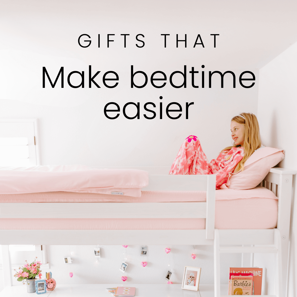 gifts that make bedtime easier: A young girls sits in her pink and white bunk bed