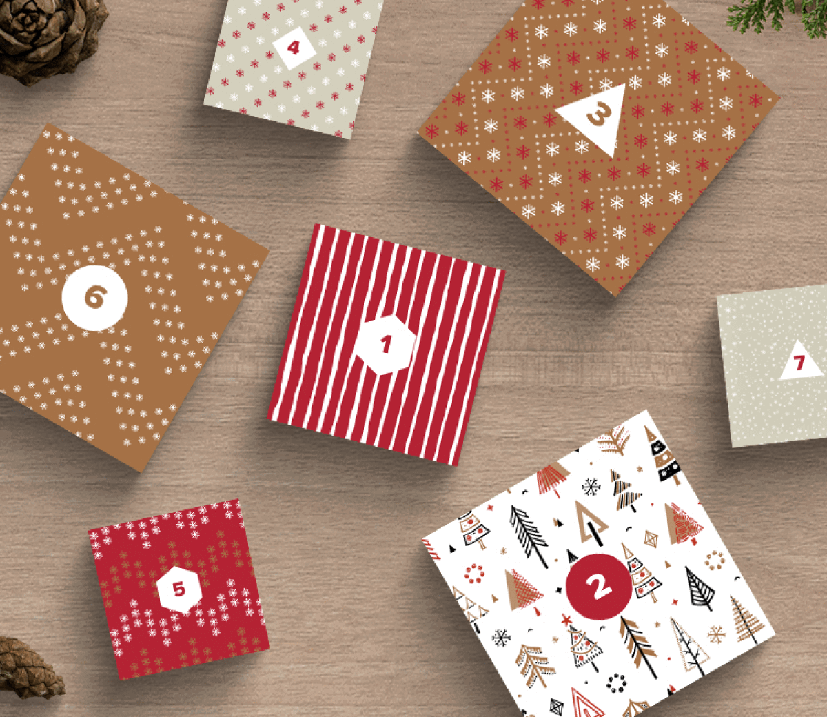 Festive holiday-themed square boxes with numbers 1 to 7 and different patterns like snowflakes, stripes, and trees, arranged on a rustic wooden background with pinecones.