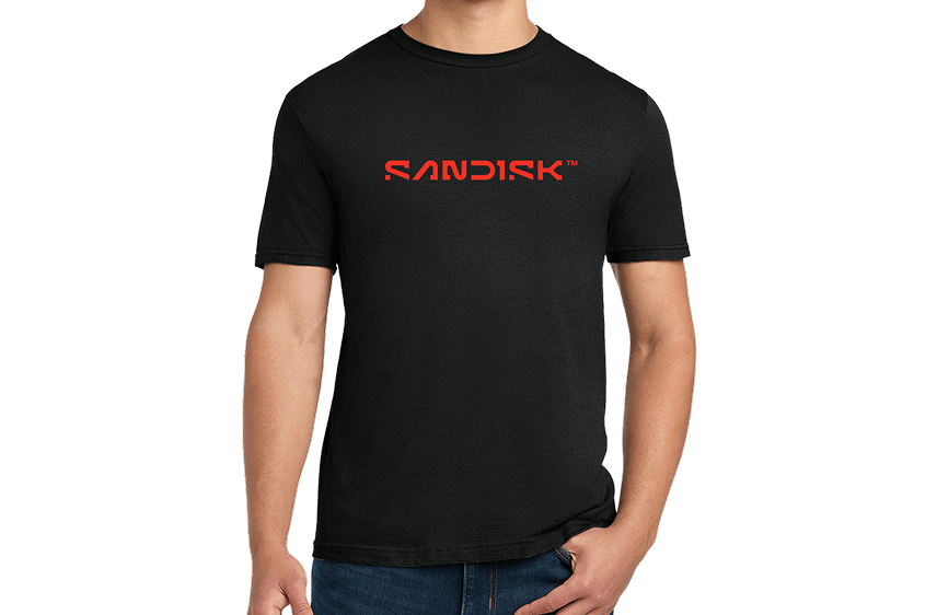 Close up of a person wearing a black t-shirt with "SANDISK™" in red lettering.