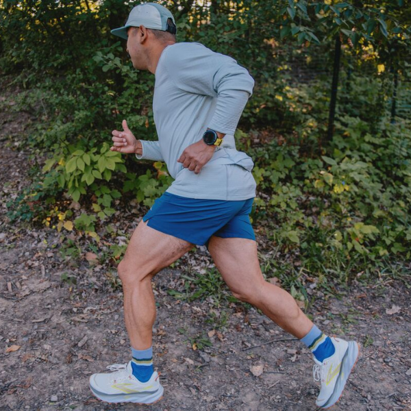 Man running on a trail
