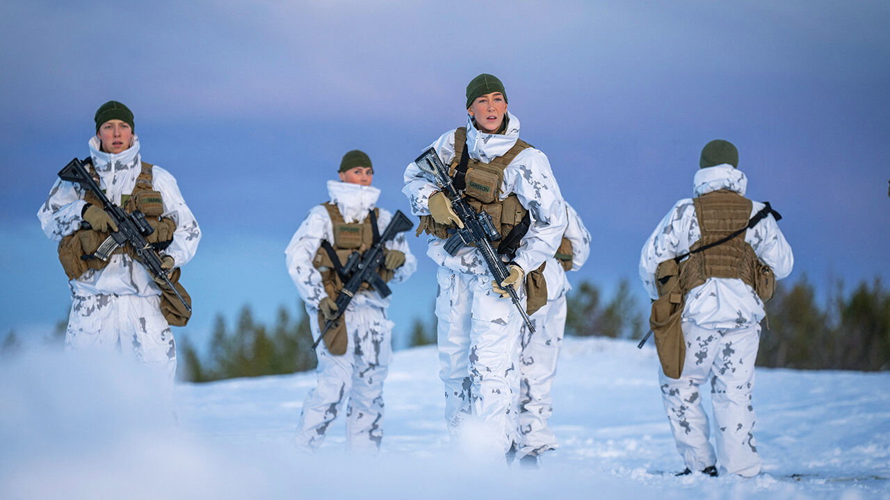 Norwegian soldiers on patrol in snow uniform 