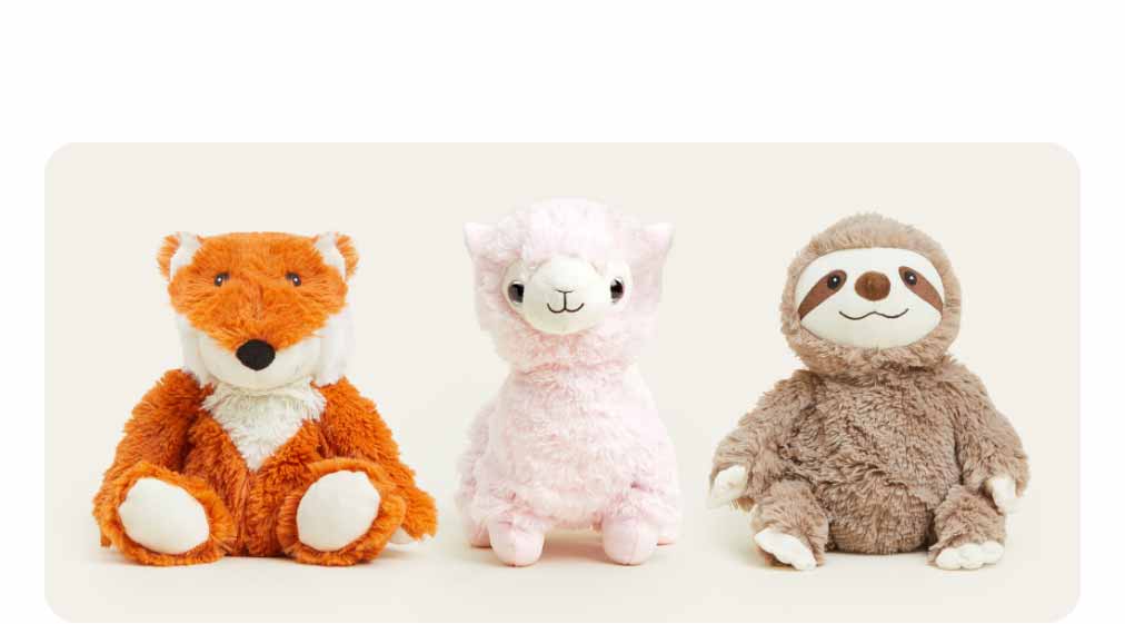 Birthday Gift Collection Warmies on a beige background. Shop Now.