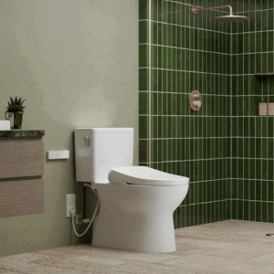 A GLASTON WASHLET+ Two-Piece Skirted Toilet in a colorful bathroom in front of a green tiled shower
