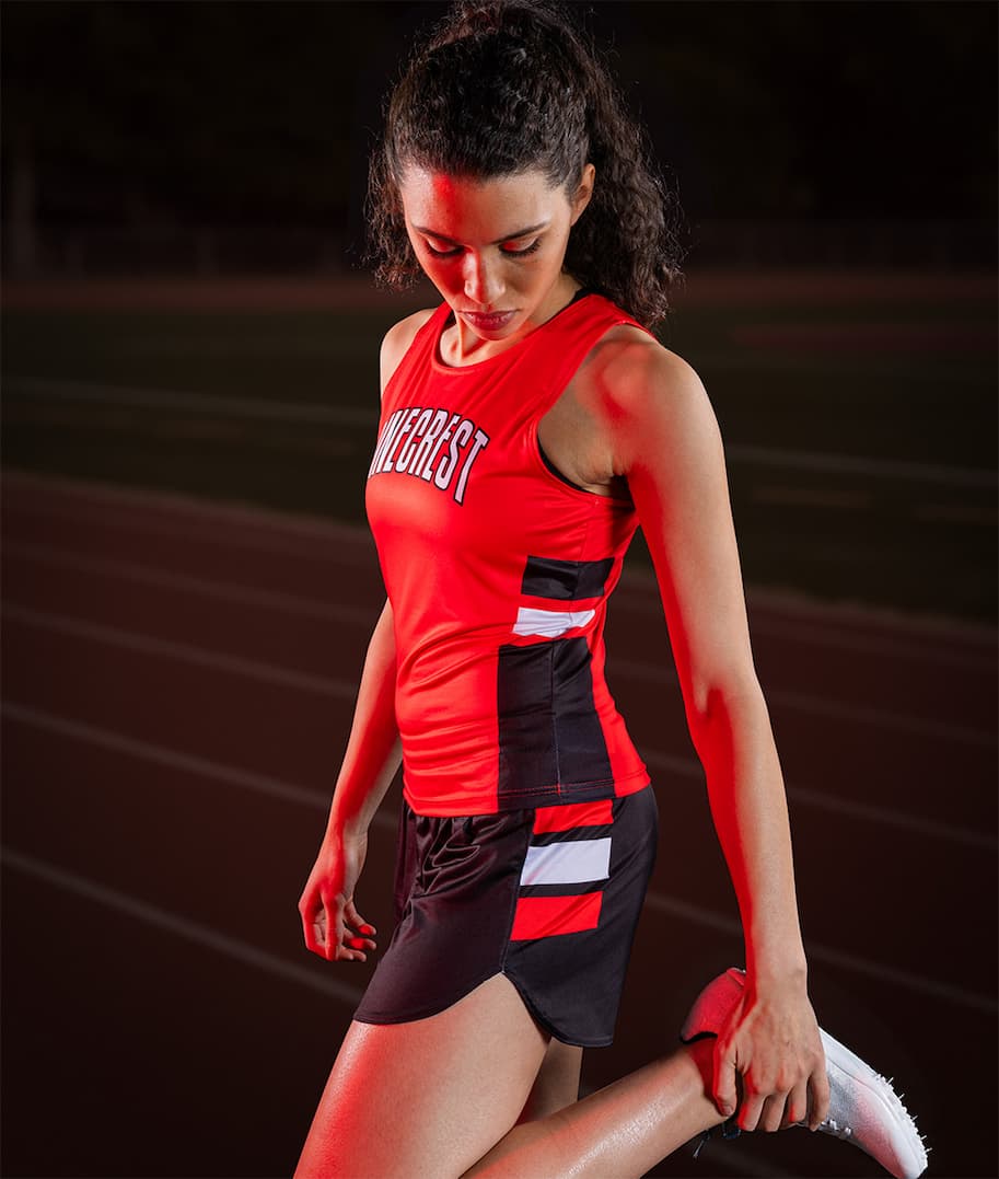 Girl stretching for track and field run