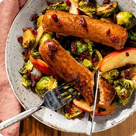 Plant-Based Skillet Bratwurst with Apples and Brussels Sprouts