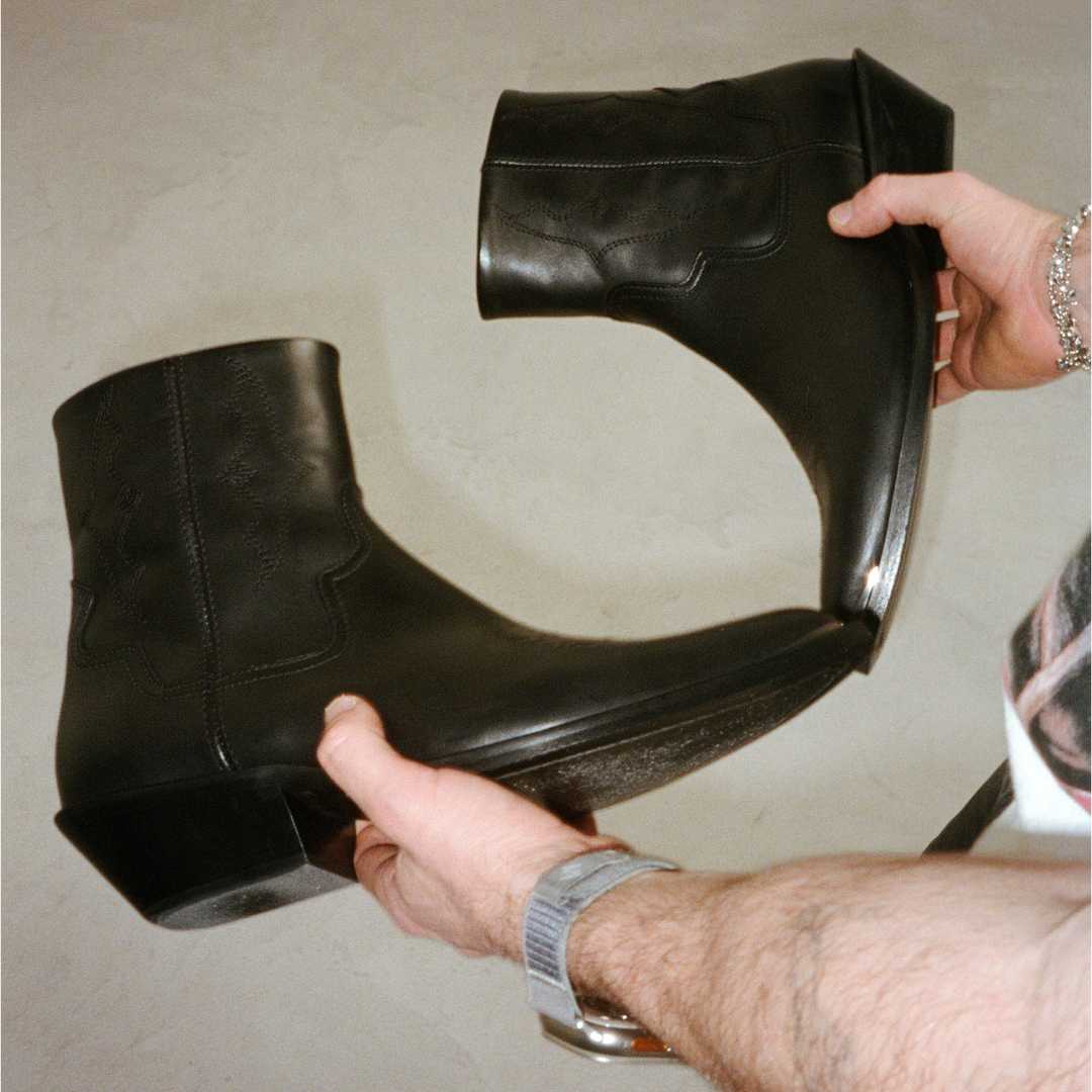 Michael Zip Boot in hand