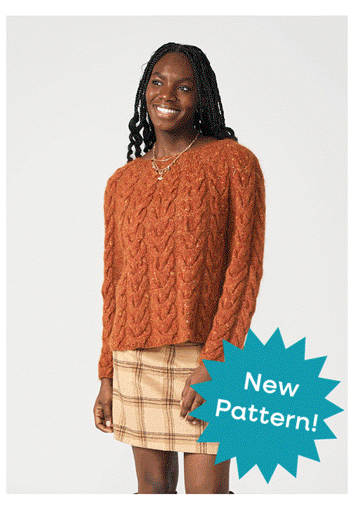 A model wearing a handmade sweater
