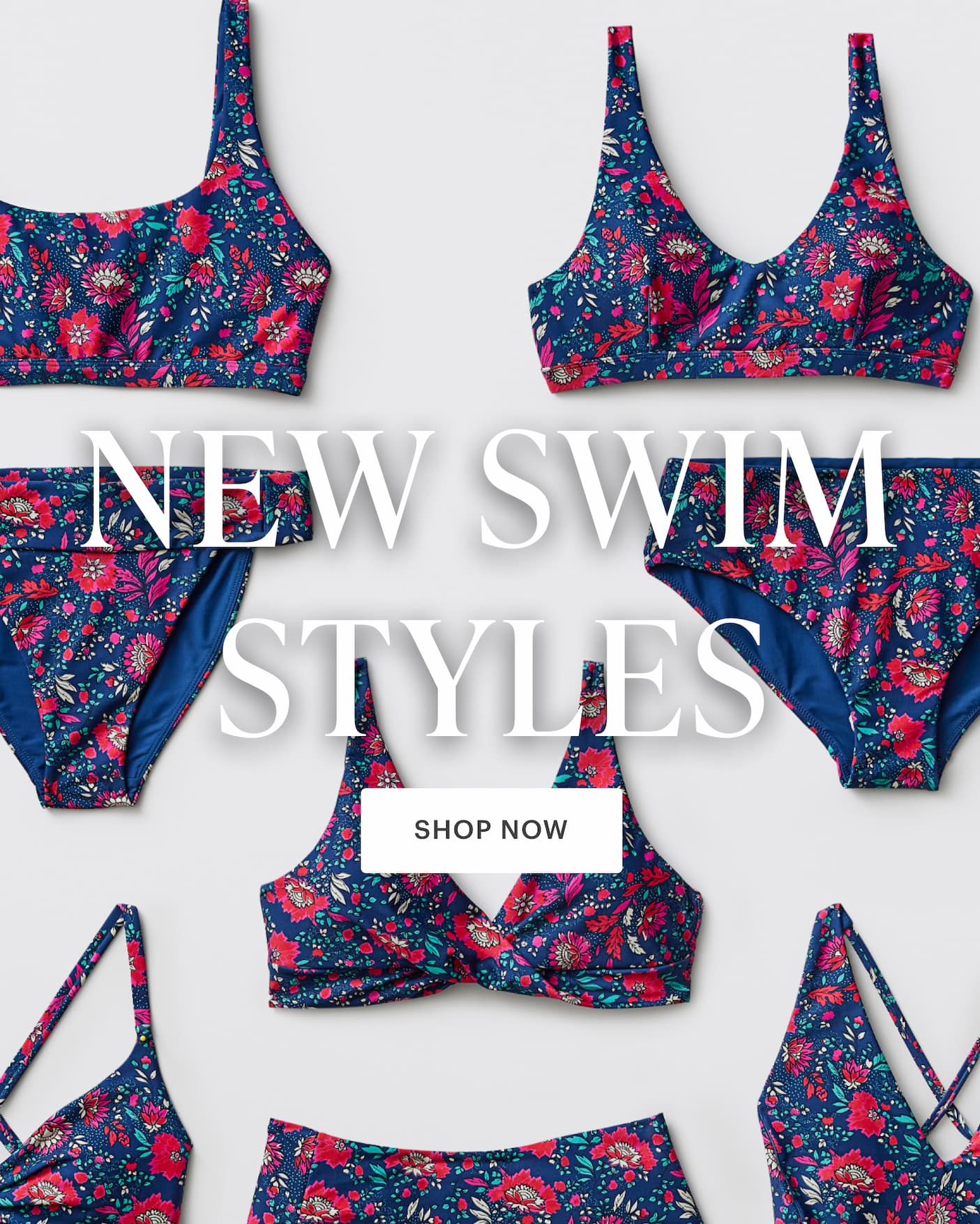 New Swim Styles - Assortment of Isla print swim pieces on gray background.