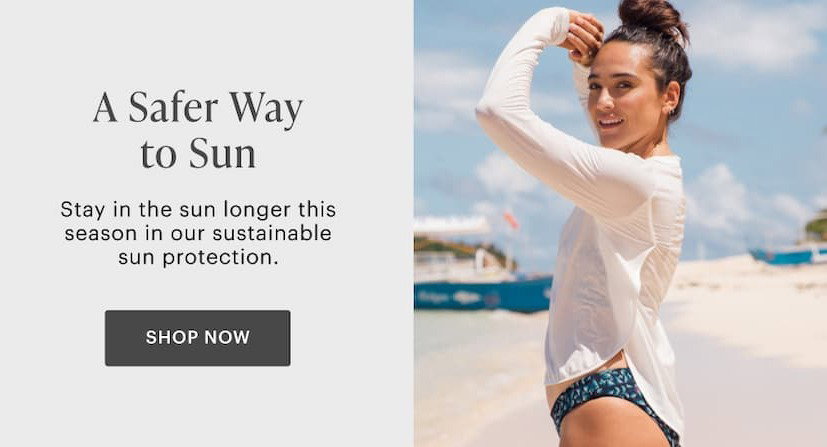 A Safer Way to Sun - Stay in the sun longer this season with our sustainable sun protection. Shop now. Soman in white sunshirt with beach behind. 