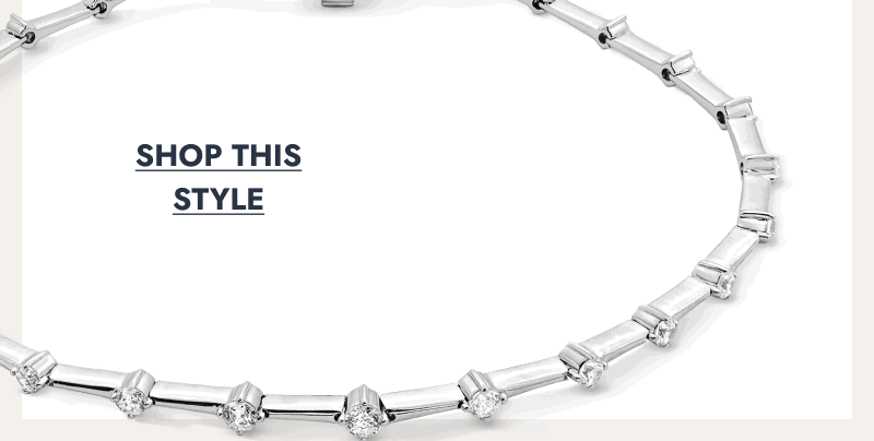 Silver bracelet with diamond accents along rectangular links. Click to shop this style.