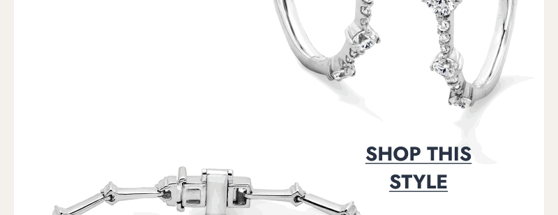 Silver diamond hoop earrings with round diamonds. Click to shop this style.