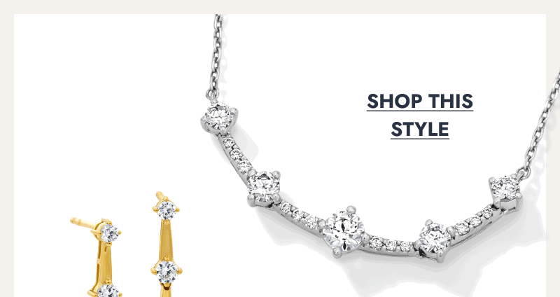 Curved silver diamond necklace with graduated round stones. Click to shop this style.