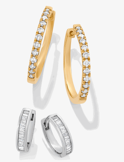 Yellow and white gold diamond hoop earrings with round and baguette-cut diamonds.
