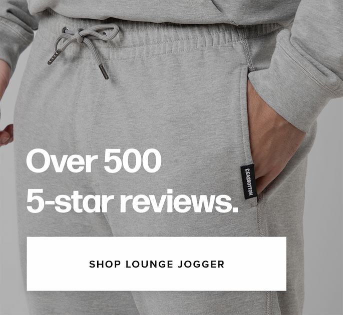 Over 500 5-star reviews. Shop Lounge Jogger. Close-up detail of grey heathered joggers showing the drawstring waistband and pocket with a Bearbottom tag.