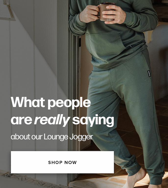 What people are really saying about our Lounge Jogger. Shop Now. Man wearing a sage green matching hoodie and jogger set holding a mug.