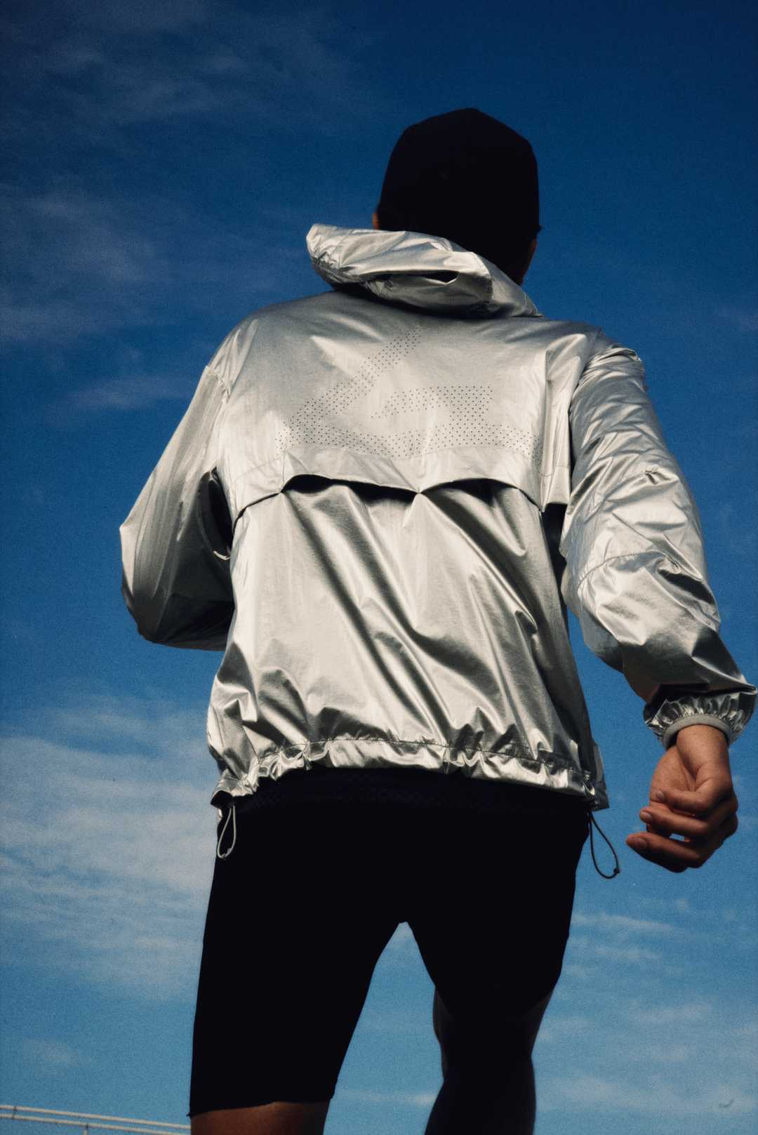 Athlete wearing the 247 Foil Jacket in Silver