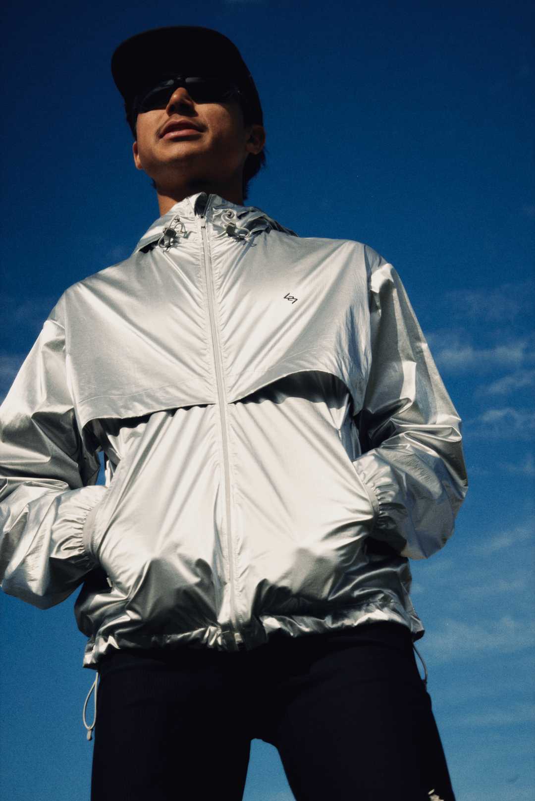 Athlete wearing the 247 Foil Jacket in Silver