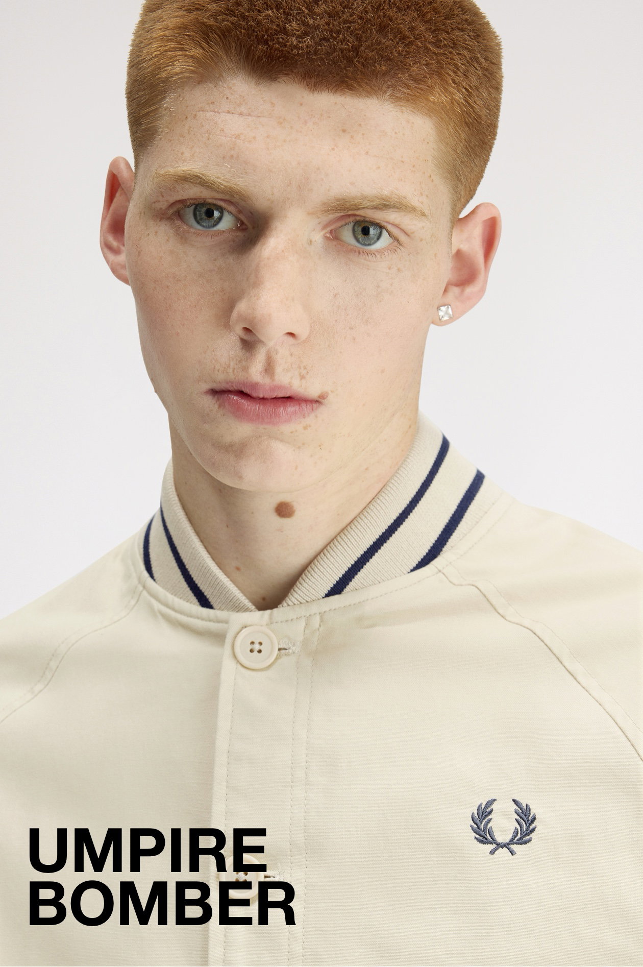 Model wearing a Fred Perry Umpire Bomber Jacket in Oatmeal