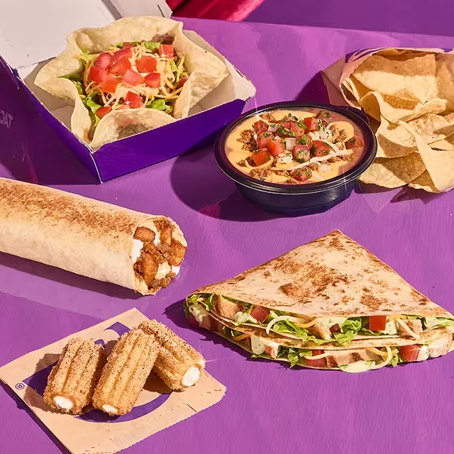 Luxe Value Menu items displayed on a purple table.