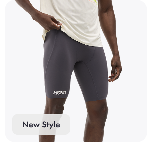 A full body image of a person facing to the left zipping up their GlideTech Top in Faded Navy.  An image of a person posing in HOKA apparel featuring the 2-in-1 Glide Shorts in Midnight Blue. A close up image of a person from the waist down wearing the Race Day Half Tight in Squid Ink. A close up image of a persons chest wearing the Airolite Short Sleeve 2.0 in Lava. A close up image of a person from the back wearing the Race Day Split-Shorts in Squid Ink.