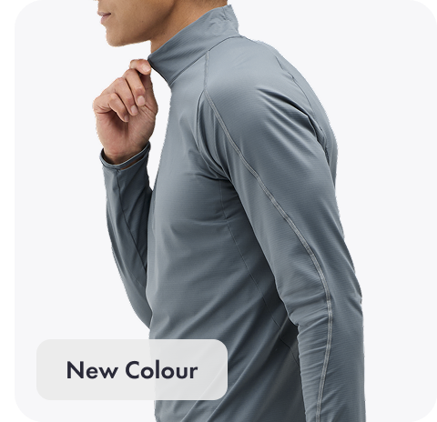 A full body image of a person facing to the left zipping up their GlideTech Top in Faded Navy.  An image of a person posing in HOKA apparel featuring the 2-in-1 Glide Shorts in Midnight Blue. A close up image of a person from the waist down wearing the Race Day Half Tight in Squid Ink. A close up image of a persons chest wearing the Airolite Short Sleeve 2.0 in Lava. A close up image of a person from the back wearing the Race Day Split-Shorts in Squid Ink.
