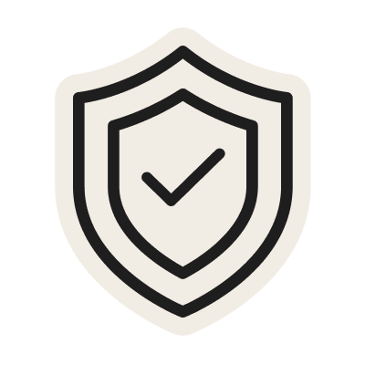 an image of a black and white shield with a tick symbol