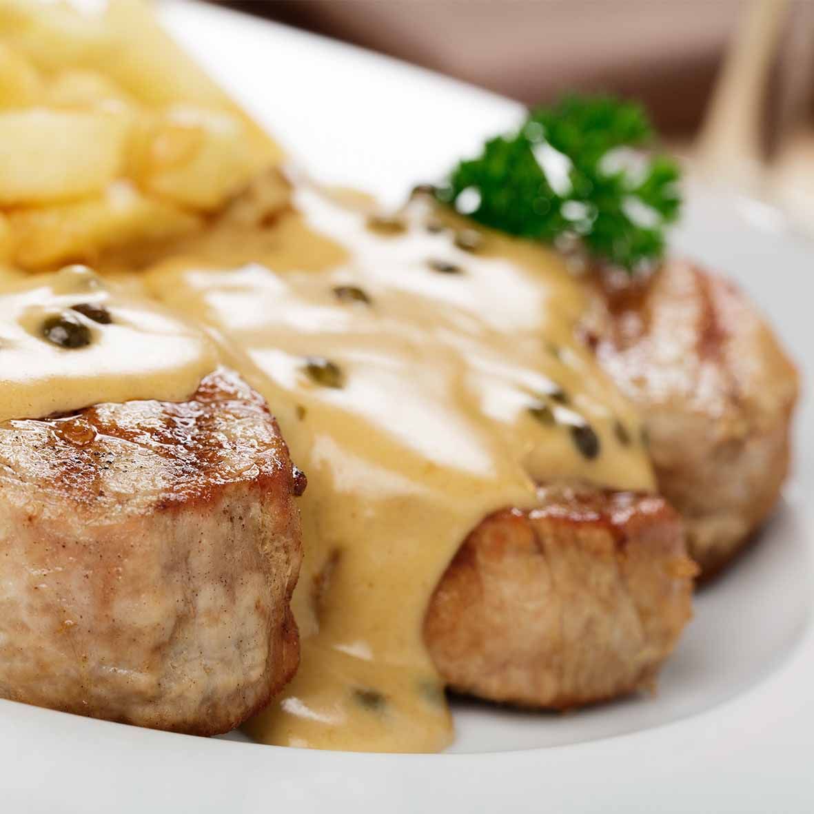 Schweinemedaillons in Orangen-Pfefferschmand – fruchtig & würzig (2 × 250 g)