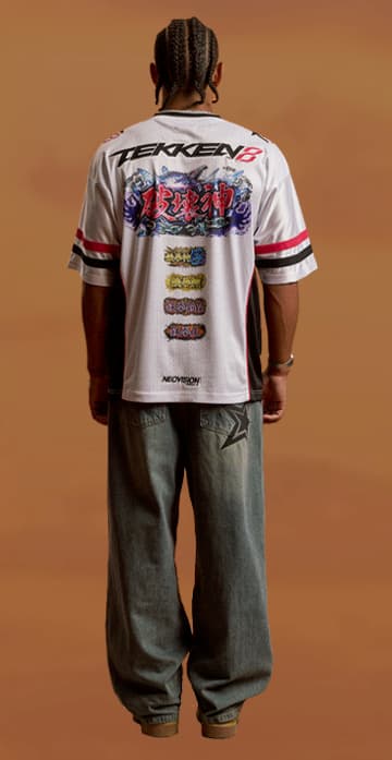 an image of a man with dreadlocks standing in the desert