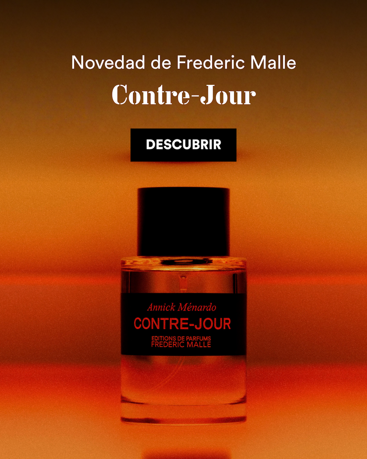 an image of a bottle of perfume with a black cap