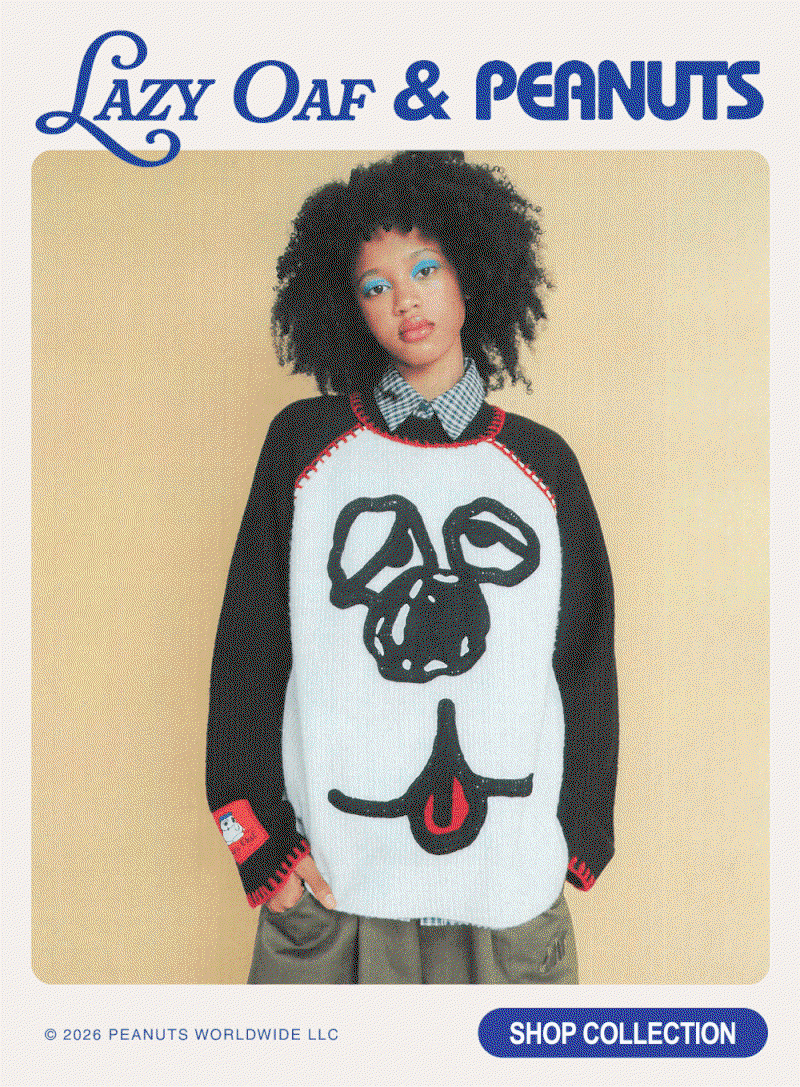 an image of a woman wearing a sweater with a face on it