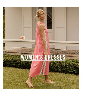 Women's dresses. Woman wearing pink maxi dress.