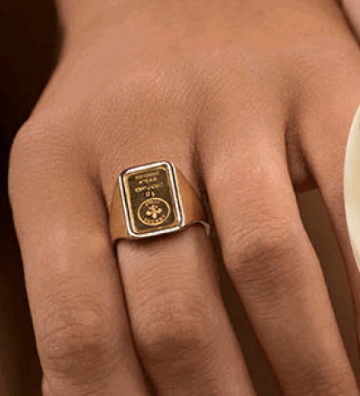 Model Wearing Rectangular Yellow Gold Signet Ring.