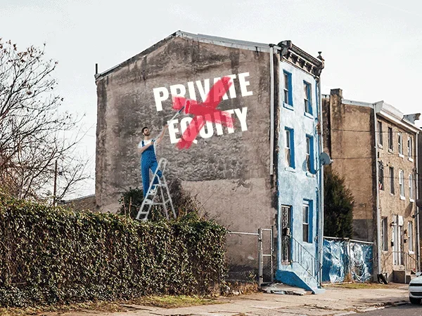 Mural reading "Private Equity" with a red X painted over it on a building in Kensington, Philadelphia.