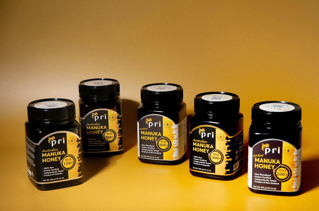 an image of a group of jars of honey sitting on a counter