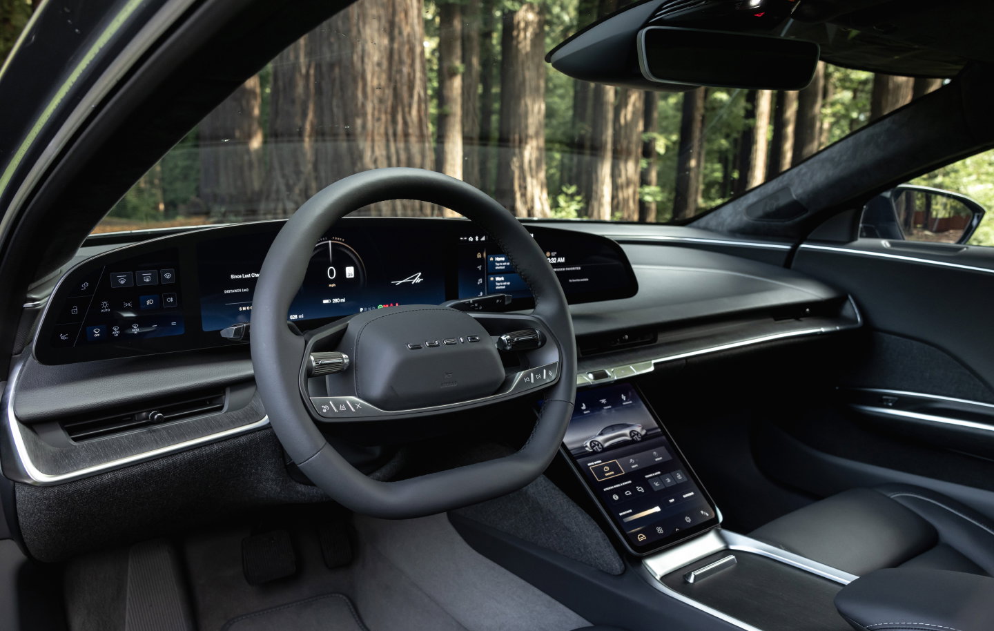 Man walking to a Lucid Air