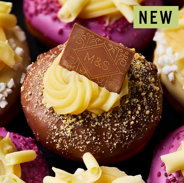 Enriched doughnut, filled with custard cream biscuit crème 