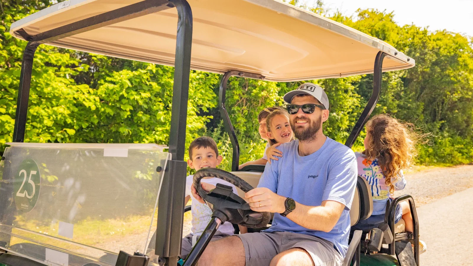 family on buggy on a sunny day