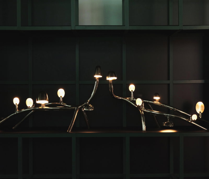 An abstract lamp with multiple bulbs, resembling tree branches