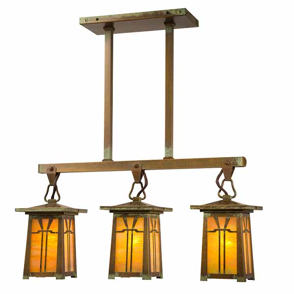 A three-light Craftsman style linear chandelier.