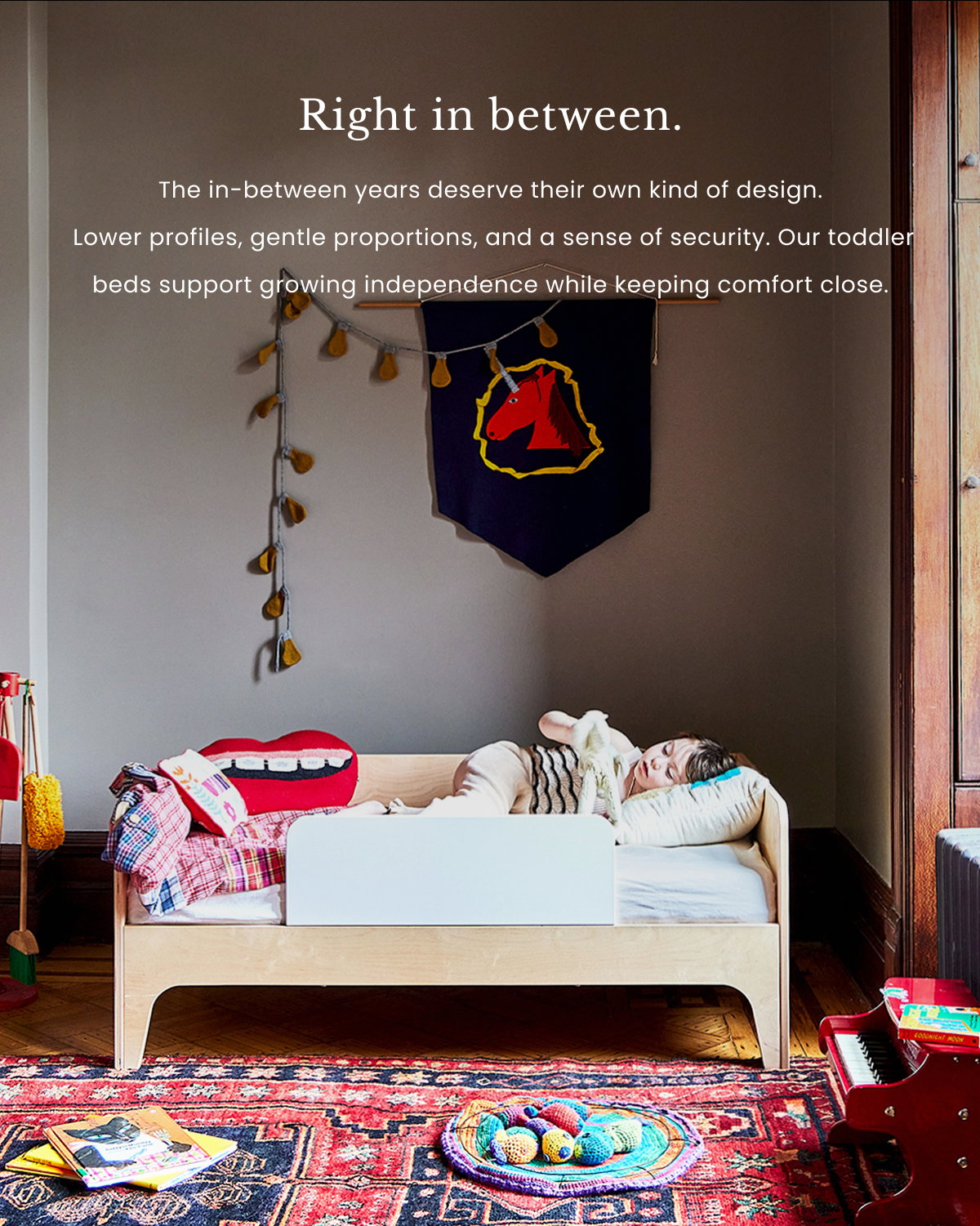 an image of a child's room with a crib and a rainbow