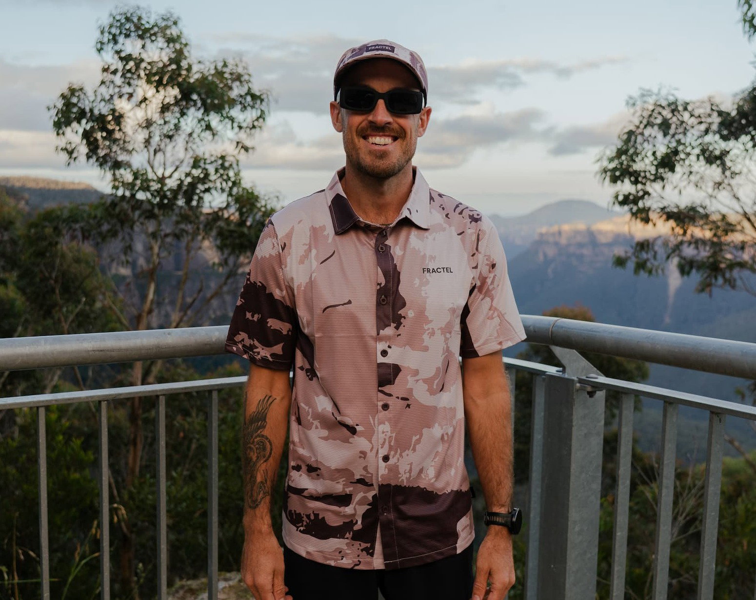 A Fractel runner wearing the Performance Collared Shirt