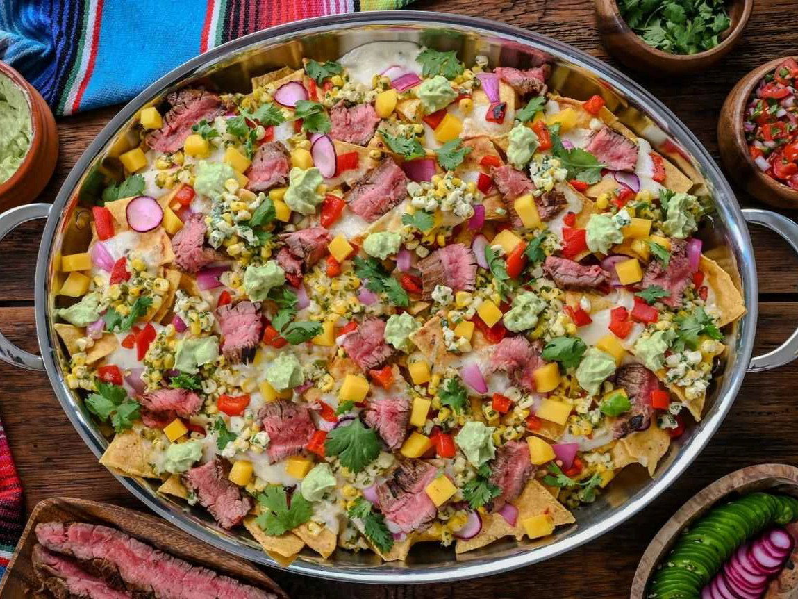 IMG: Carne Asada Nachos with Elote Salsa & Oaxaca Fondue