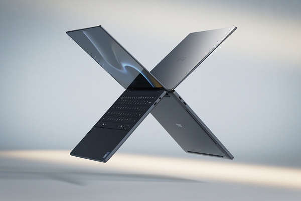 Beauty shot of two Dell XPS laptops in a light world.