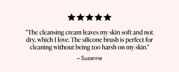 Five-star customer review from Suzanne reading: "The cleansing cream leaves my skin soft and not dry, which I love. The silicone brush is perfect for cleaning without being too harsh on my skin."