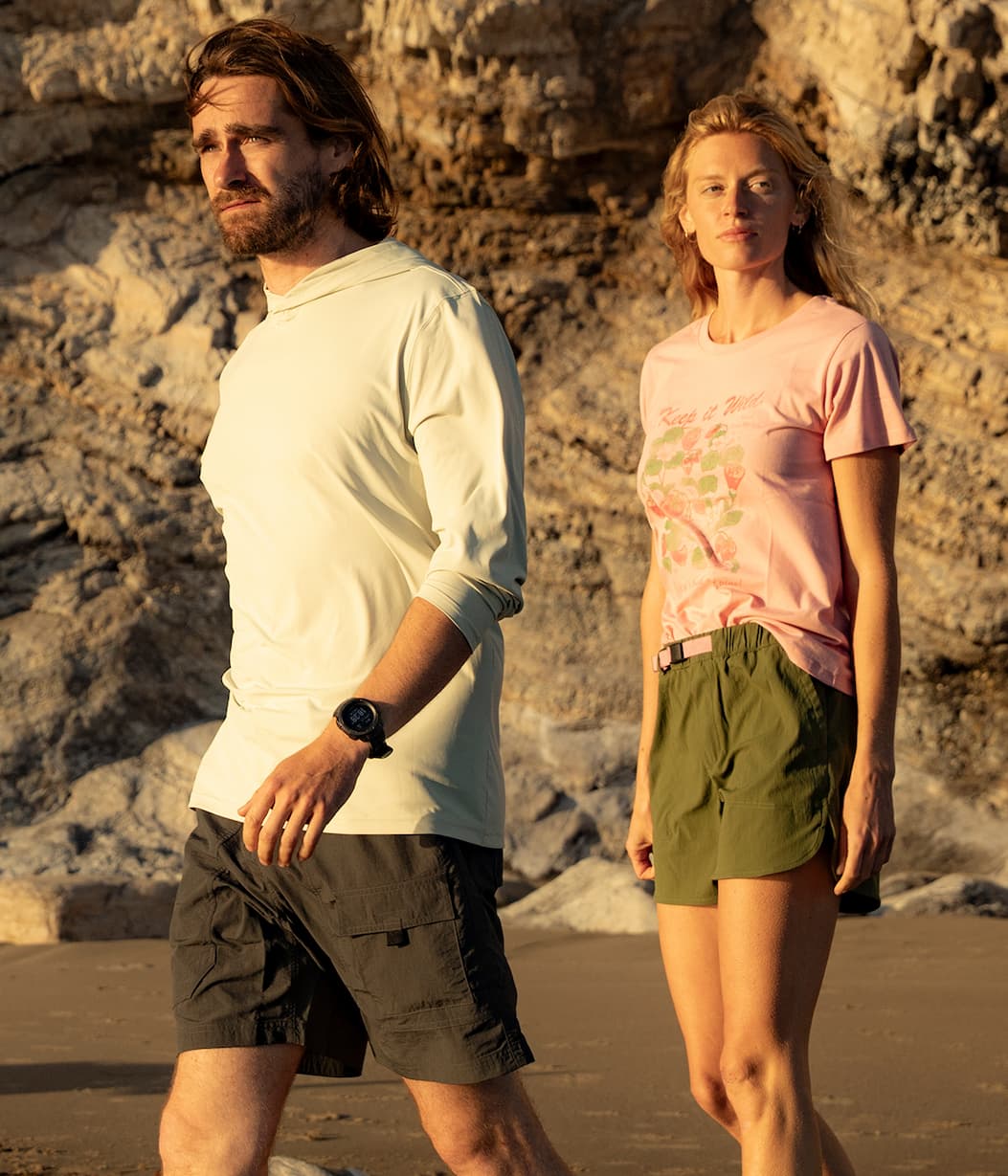 Man and Woman in Eddie Bauer shorts.