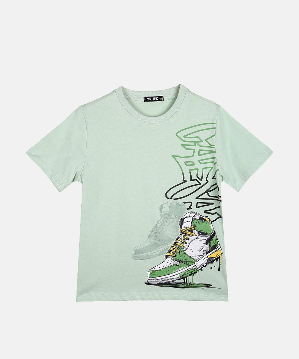 Children's mint green round-neck T-shirt with right-side graphic of a dripping green-and-white high-top sneaker and stylised text